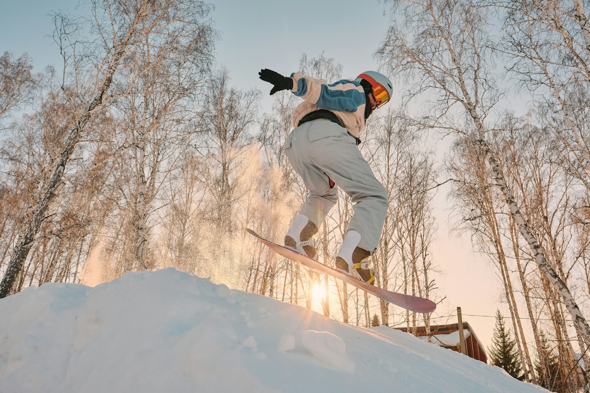 a person riding a snowboard